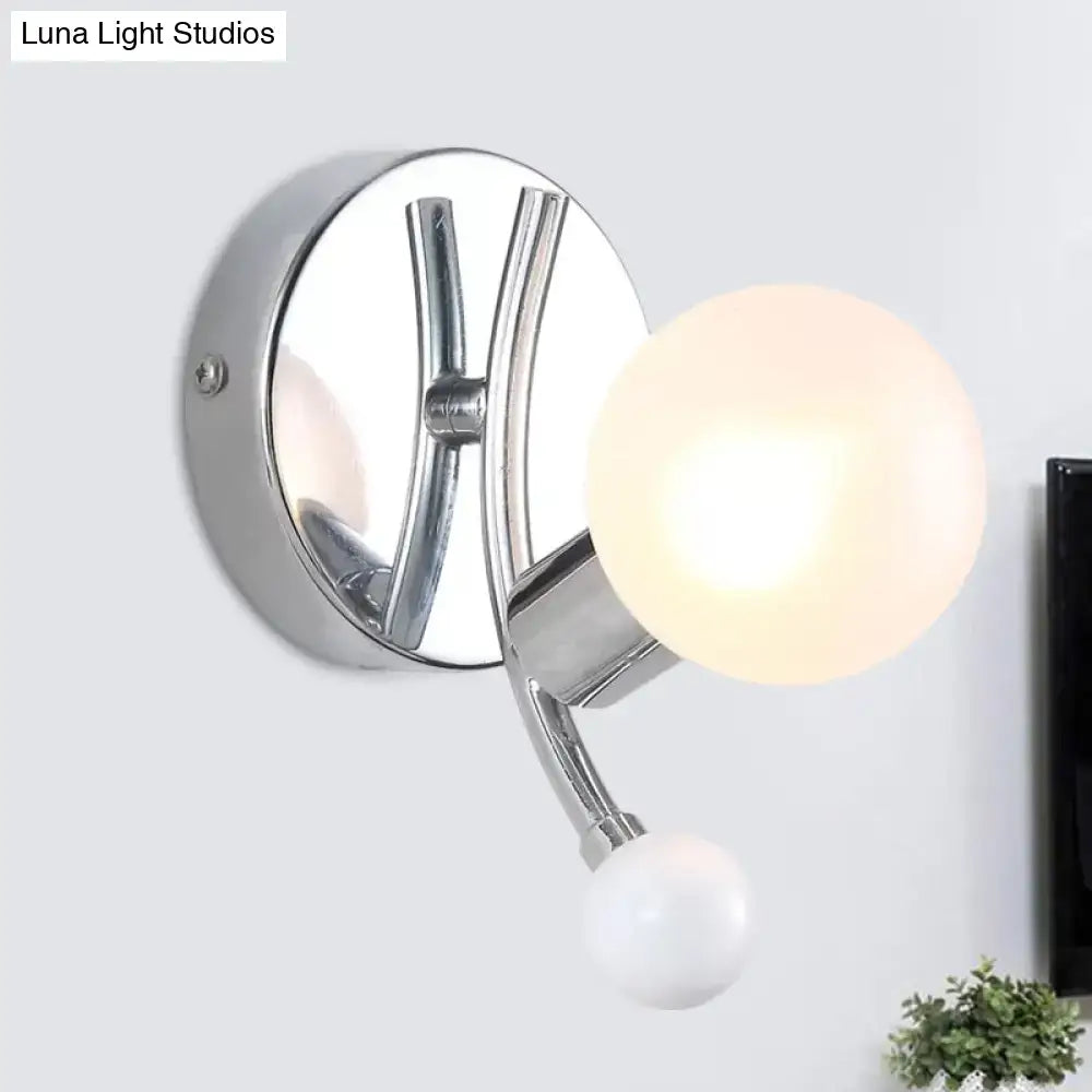 Chrome Globe Wall Sconce by Decorbites, chrome mount with frosted glass globe and curved arm on Tampa Home & Garden Store