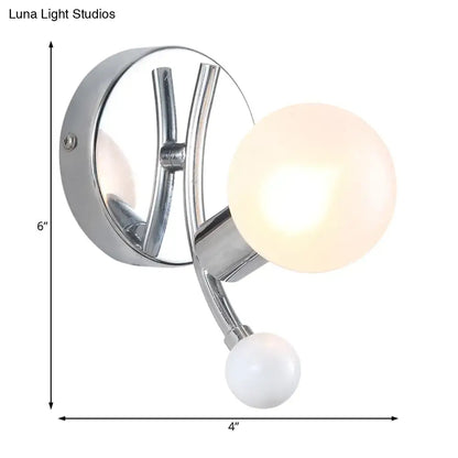 Decorbites chrome globe wall sconce with large warm-white glass globe and small accent globe on Tampa Home & Garden Store