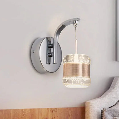 Chrome Seeded Crystal Wall Lamp by Decorbites; curved chrome arm with seed crystal shade on Tampa Home & Garden Store