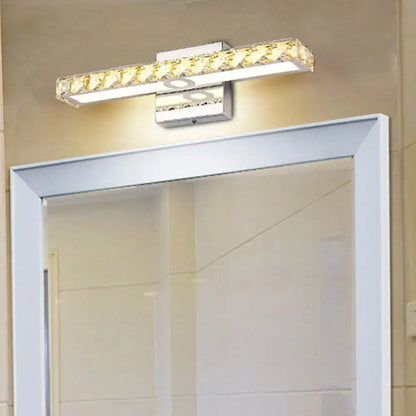 Chrome linear wall sconce Decorbites with crystal lattice trim above bathroom mirror on Tampa Home & Garden Store