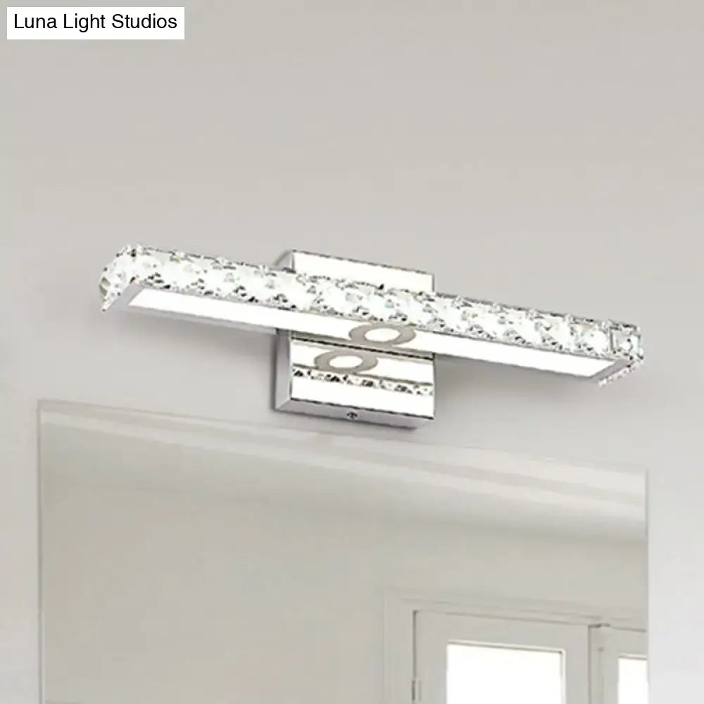 Chrome linear wall sconce with crystal accents, wall-mounted over bathroom mirror on Tampa Home & Garden Store