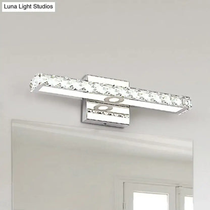 Chrome linear wall sconce with crystal accents, wall-mounted over bathroom mirror on Tampa Home & Garden Store