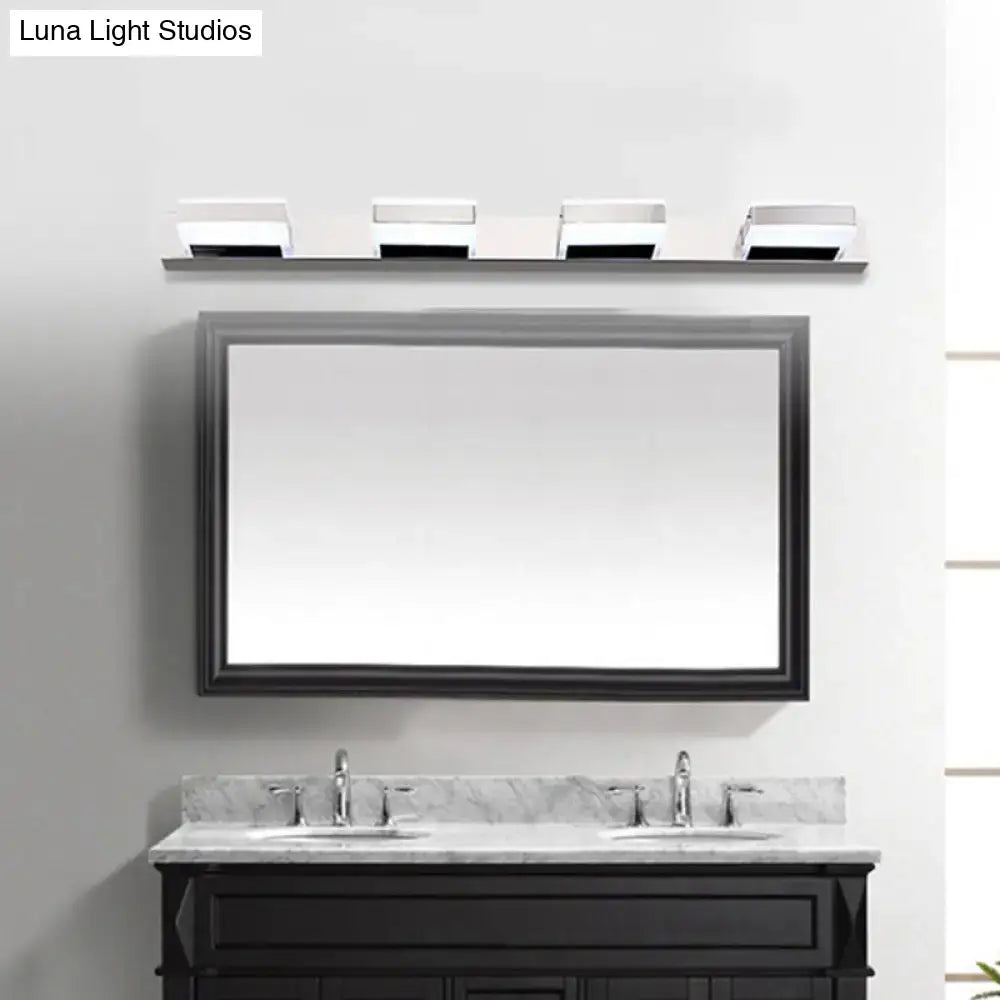 Chrome Acrylic Vanity Light by Decorbites, four chrome fixtures over a framed bathroom mirror on Tampa Home & Garden Store