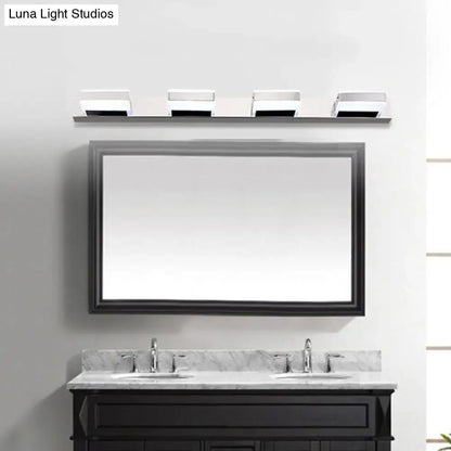 Chrome Acrylic Vanity Light by Decorbites, four chrome fixtures over a framed bathroom mirror on Tampa Home & Garden Store