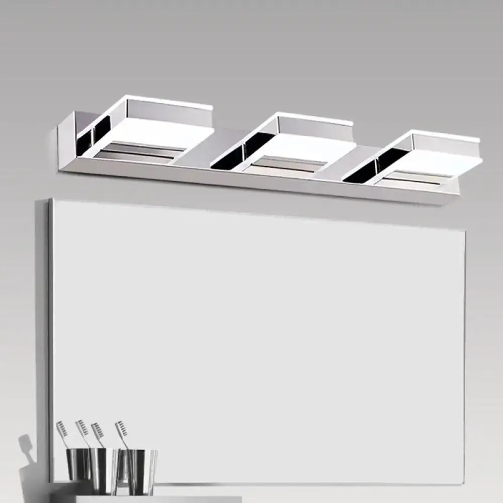 Decorbites chrome acrylic vanity light three-light bar over a bathroom mirror on Tampa Home & Garden Store
