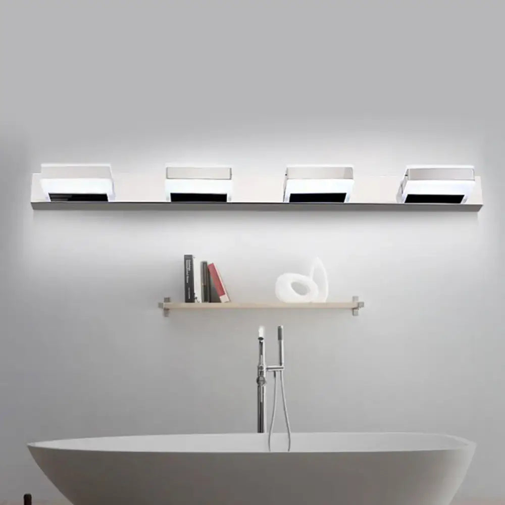 Chrome Acrylic Vanity Light with four white fixtures on a slim chrome bar above a tub Decorbites on Tampa Home & Garden Store