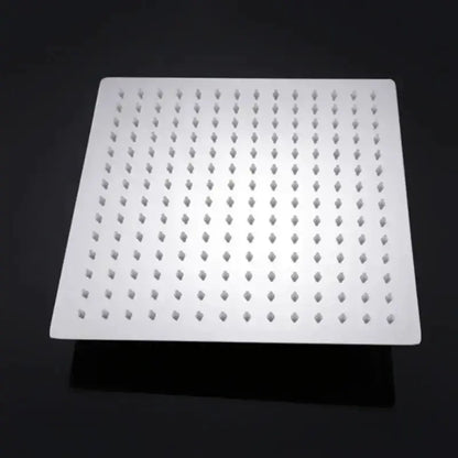 Square chrome rainfall shower head with white face and grid of nozzles Decorbites on Tampa Home & Garden Store