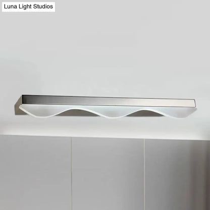 Chrome linear vanity light Decorbites with curved white wave diffuser on Tampa Home & Garden Store