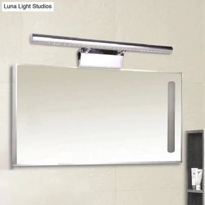 Modern chrome stainless steel bathroom wall sconce with LED light bar above mirror on Tampa Home & Garden Store