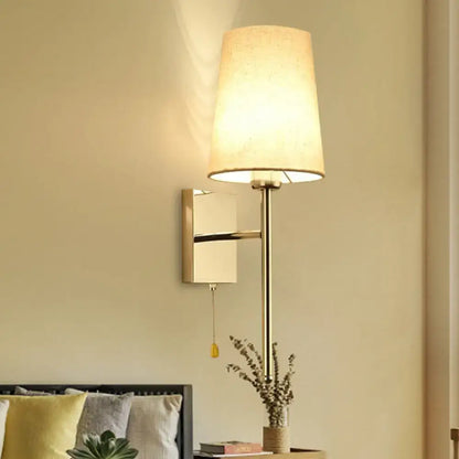 Chrome fabric tapered wall sconce with cream shade and brass-tone stem on Tampa Home & Garden Store