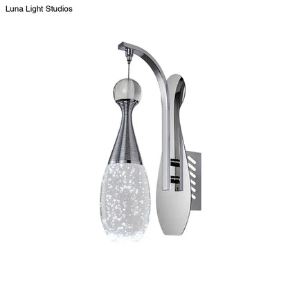 Chrome Crystal Seeded Glow Wall Sconce with curved arm and seeded glass shade on Tampa Home & Garden Store