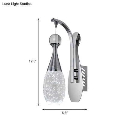 Chrome Crystal Seeded Glow Wall Sconce with curved arm and glass shade by Decorbites on Tampa Home & Garden Store