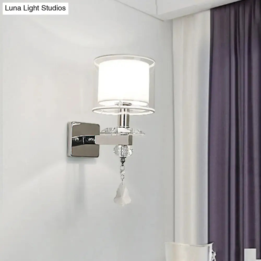 Chrome crystal glass wall sconce with white shade and dangling crystal pendant on Tampa Home & Garden Store