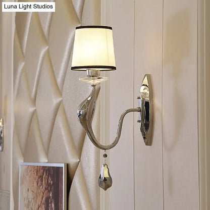 Chrome fabric crystal lamp wall sconce by Decorbites with curved arm and crystal pendant on Tampa Home & Garden Store
