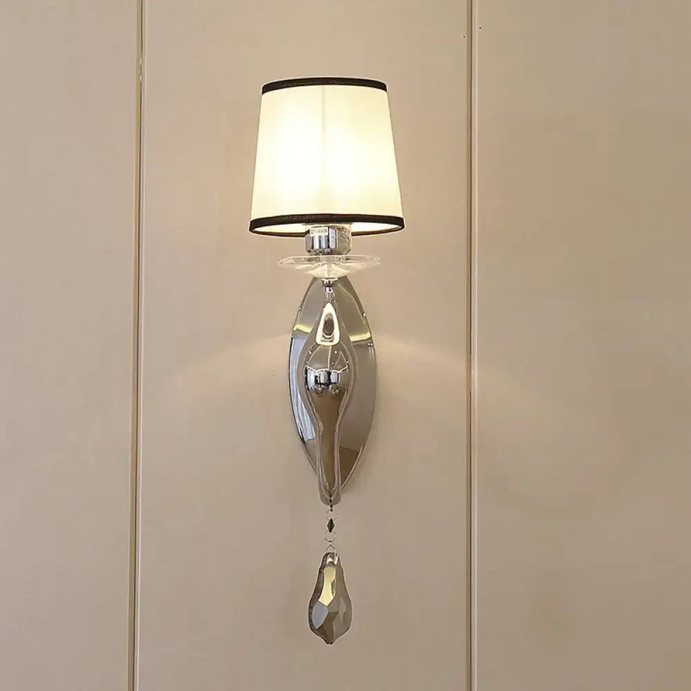 Chrome fabric crystal lamp wall sconce with beige shade and hanging crystal pendant by Decorbites on Tampa Home & Garden Store