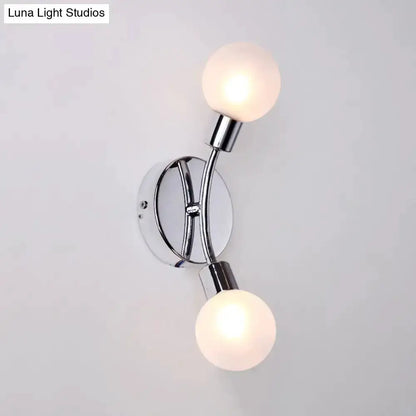 Modern chrome wall lamp with dual frosted white glass globes, bedroom sconce on Tampa Home & Garden Store
