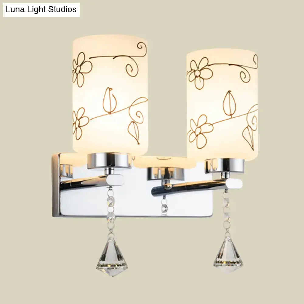 Chrome glass cylinder floral wall sconce pair with crystal pendants by Decorbites on Tampa Home & Garden Store