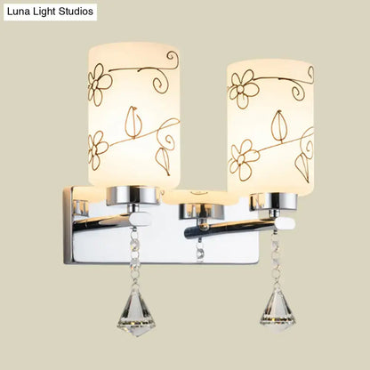 Chrome glass cylinder floral wall sconce pair with crystal pendants by Decorbites on Tampa Home & Garden Store