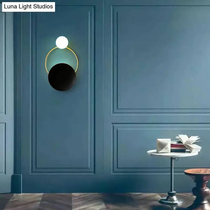 Black brass circle sconce with white globe and gold ring wall light Decorbites on Tampa Home & Garden Store