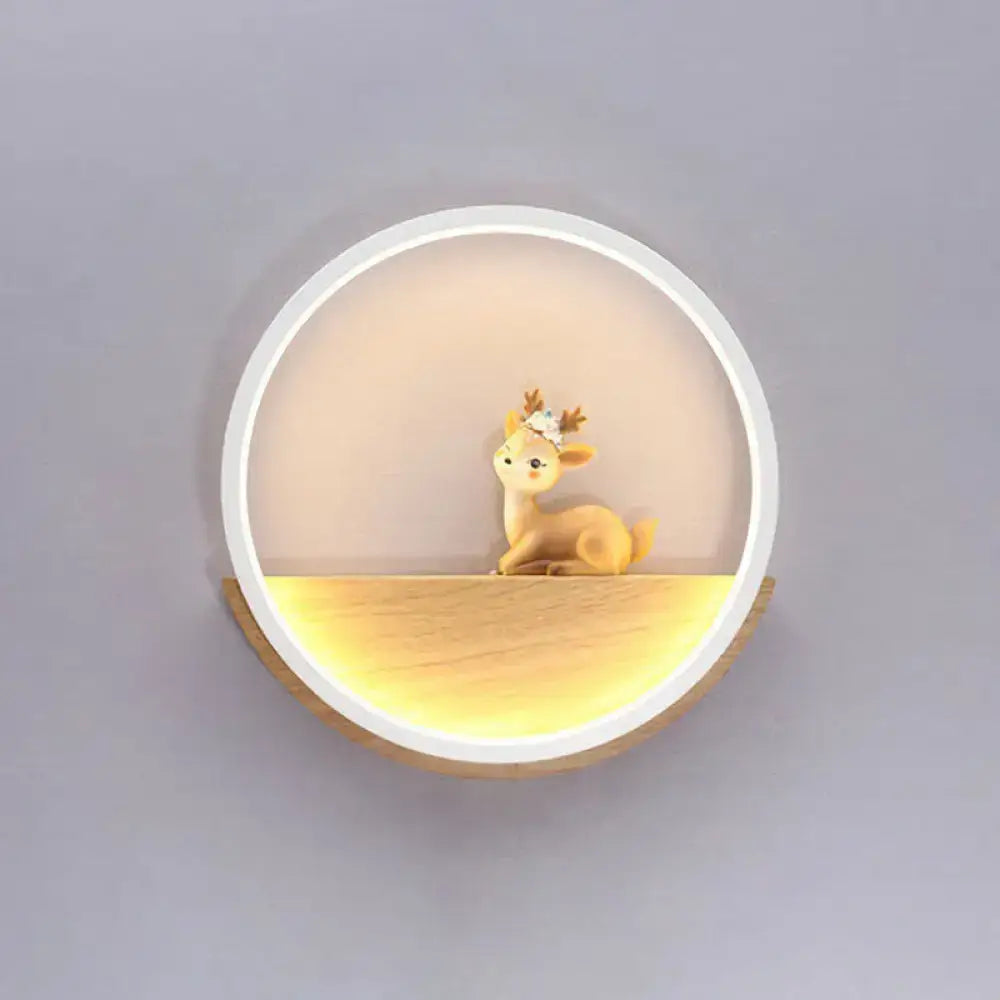 Black Deer Wall Light by Decorbites, circular white frame with warm glow and deer figurine on Tampa Home & Garden Store