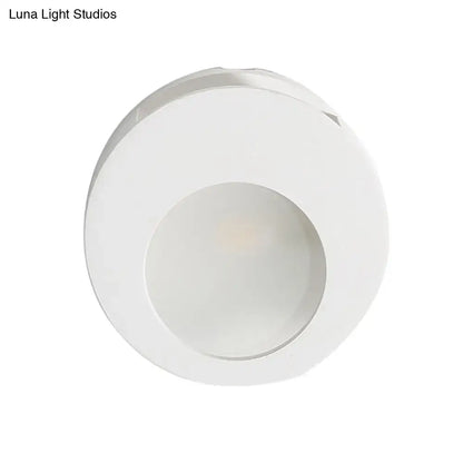 White gypsum LED wall sconce round minimalist design by Decorbites on Tampa Home & Garden Store