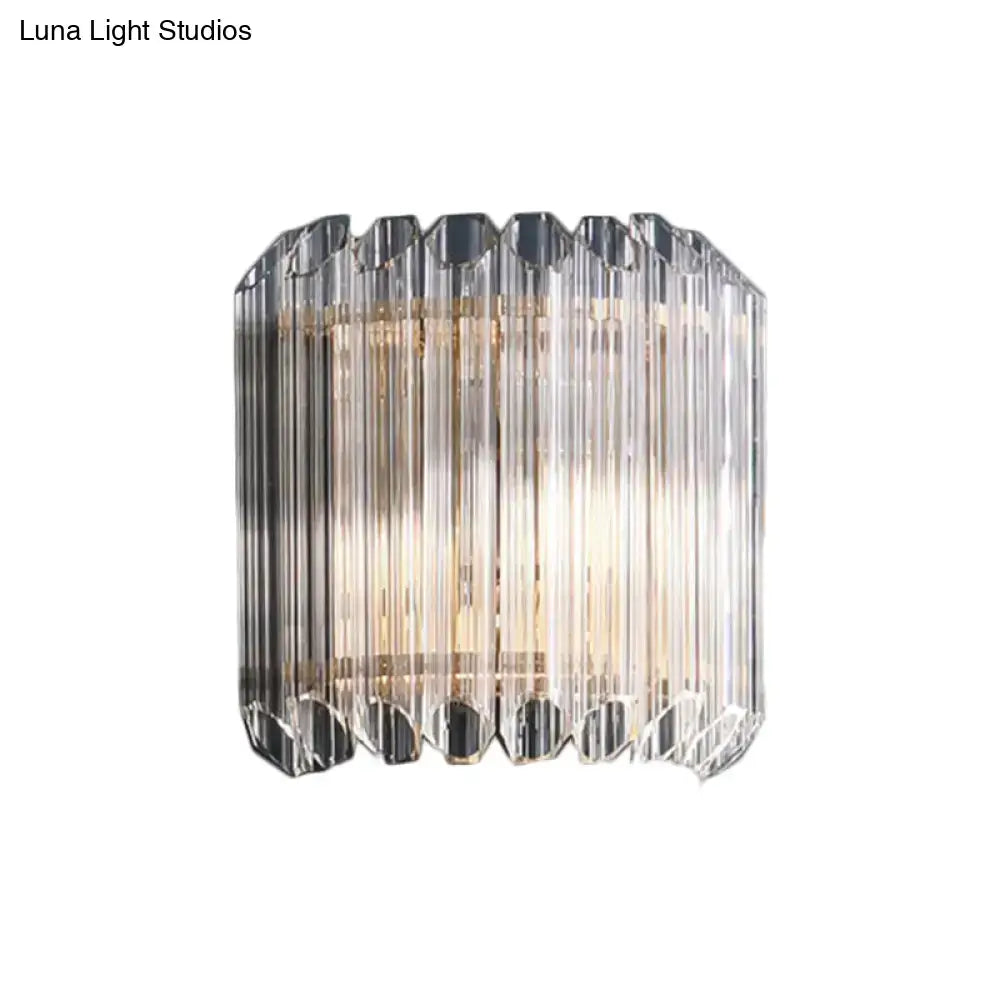 Clear crystal half-drum wall sconce with vertical prism panels by Decorbites on Tampa Home & Garden Store