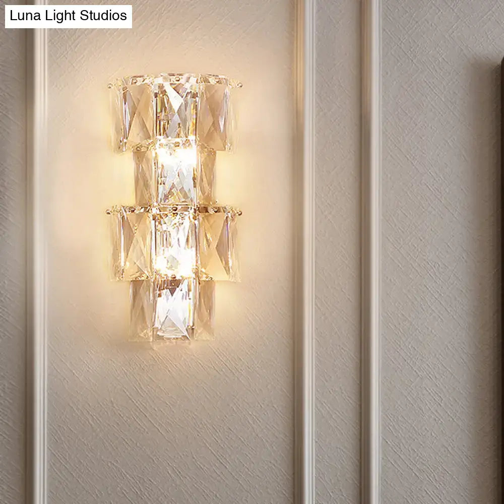 Chrome crystal tiered sconce wall-mounted with square-cut crystals, warm glow on Tampa Home & Garden Store