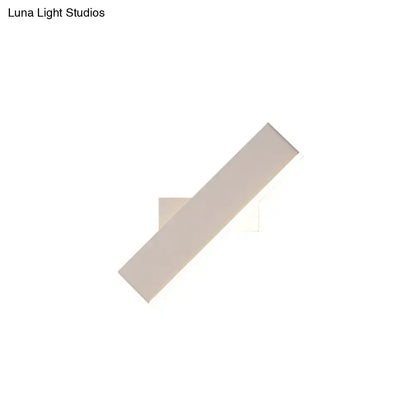 Coffee white rectangular wall sconce with a long slim bar on Tampa Home & Garden Store