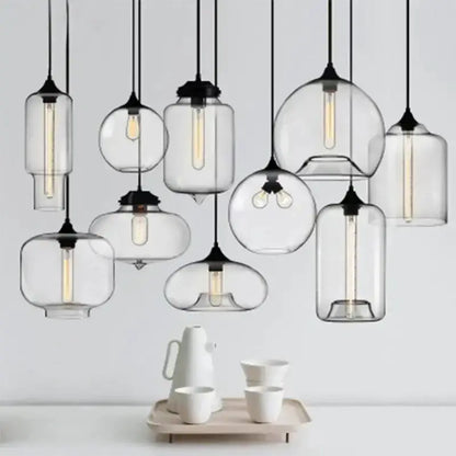 Decorbites modern glass bowl pendant lights, multiple clear glass pendants with black canopies on Tampa Home & Garden Store