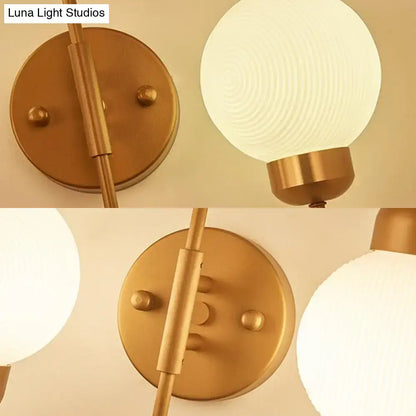 Decorbites copper-brass wall sconce with 2 frosted glass globes on Tampa Home & Garden Store