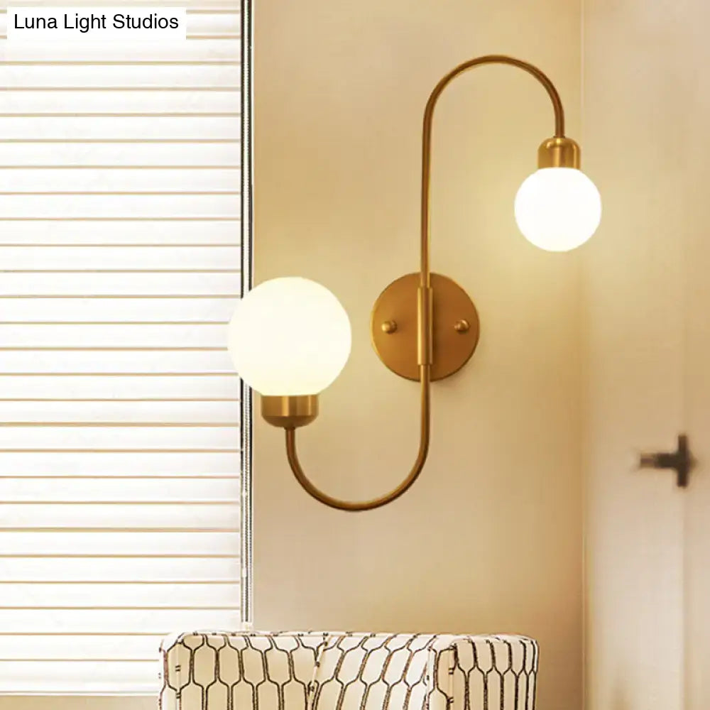 Copper Spherical Wall Sconce by Decorbites with dual frosted glass globes and brass finish on Tampa Home & Garden Store
