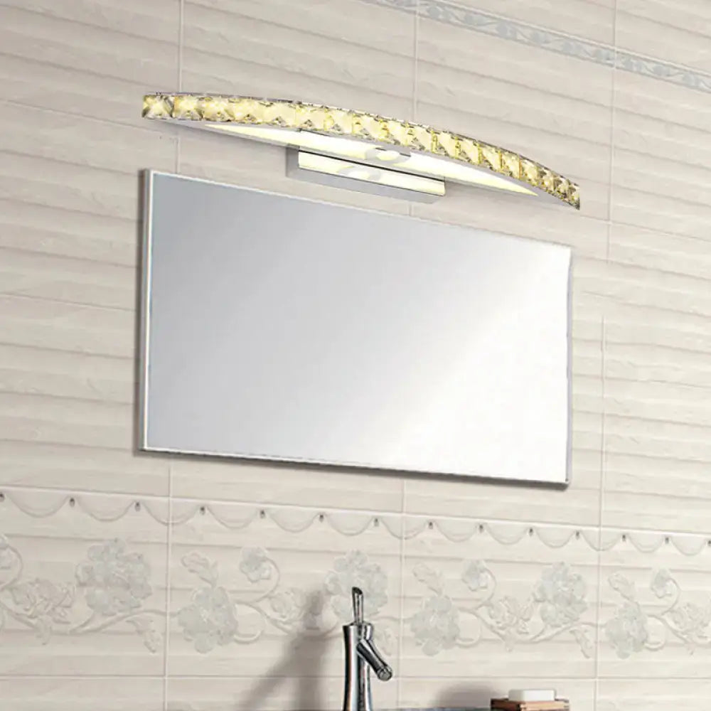 Crystal Champagne Bow Sconce by Decorbites, curved champagne crystal bar above a bathroom mirror on Tampa Home & Garden Store