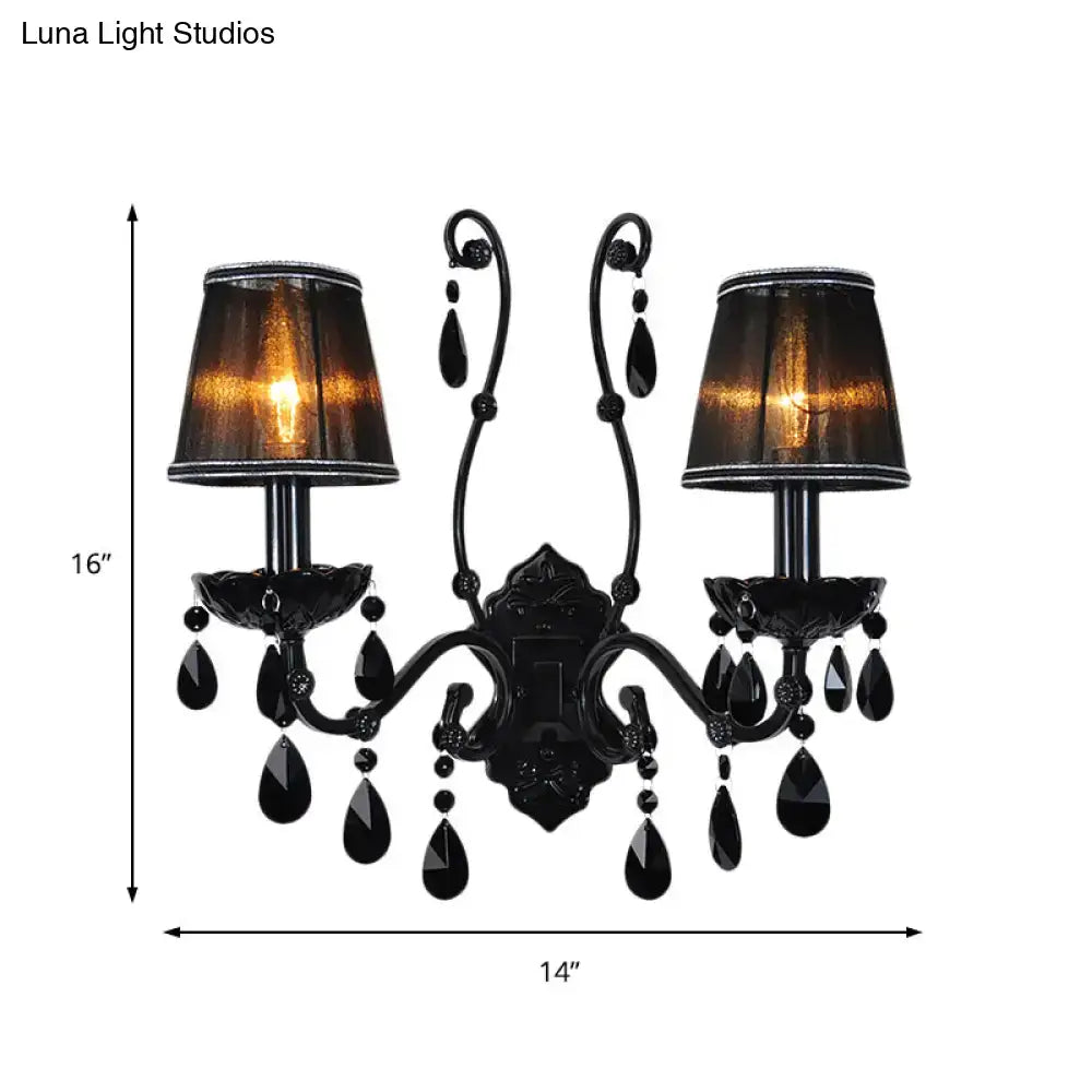 Decorbites black crystal wall sconce with cast iron shade, dual arms and hanging droplets on Tampa Home & Garden Store