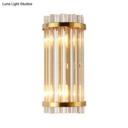 Modern crystal glass wall sconce with gold finish and vertical rods on Tampa Home & Garden Store