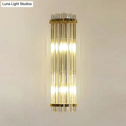 Decorbites modern crystal gold finish wall sconce with vertical glass rods on Tampa Home & Garden Store