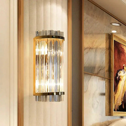 Modern crystal gold finish wall sconce with vertical prisms for bedroom lighting Decorbites on Tampa Home & Garden Store