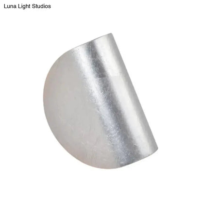 Decorbites modern curved wall sconce light in silver metal for bedroom ambient lighting on Tampa Home & Garden Store