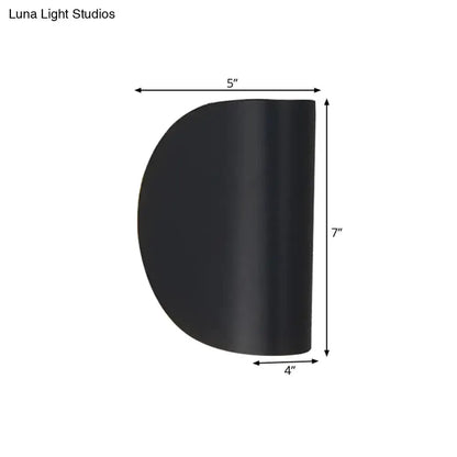 Modern curved wall sconce by Decorbites - black metal finish for bedroom lighting on Tampa Home & Garden Store
