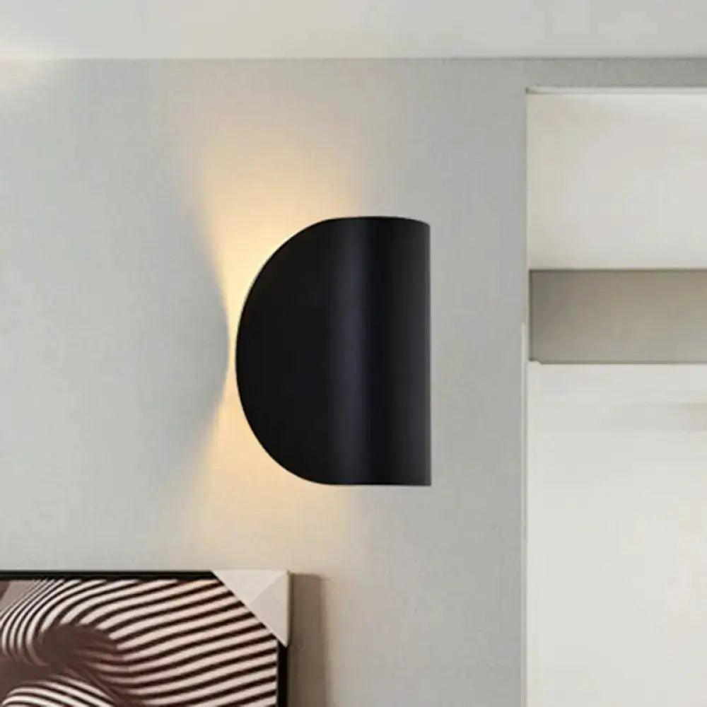 Curved black wall sconce by Decorbites for bedroom ambient lighting on Tampa Home & Garden Store
