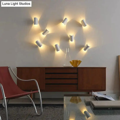 Wall sconces white curved fixtures by Decorbites with warm ambient glow for bedroom on Tampa Home & Garden Store
