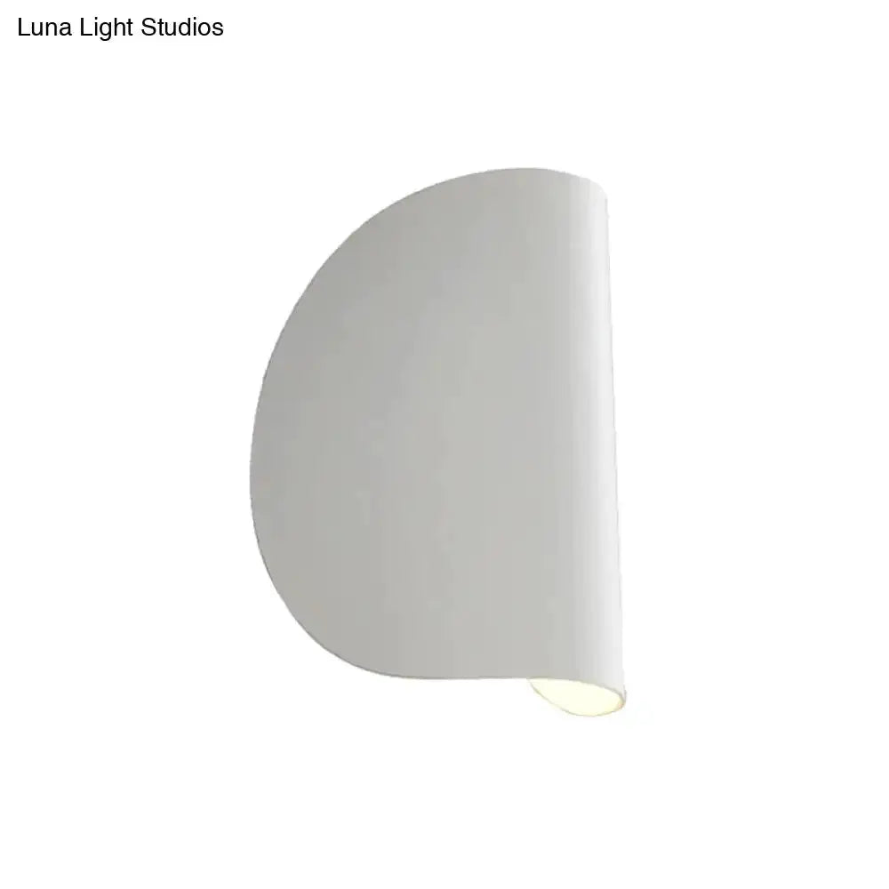Modern curved wall sconce light with white shade, bedroom lighting on Tampa Home & Garden Store