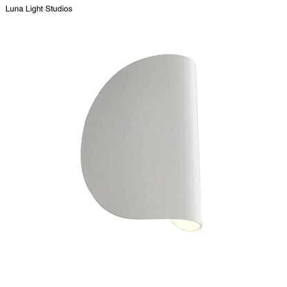 Modern curved wall sconce light with white shade, bedroom lighting on Tampa Home & Garden Store