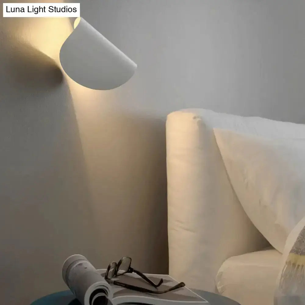 Modern curved white wall sconce light, wall-mounted for bedroom ambient lighting Decorbites on Tampa Home & Garden Store