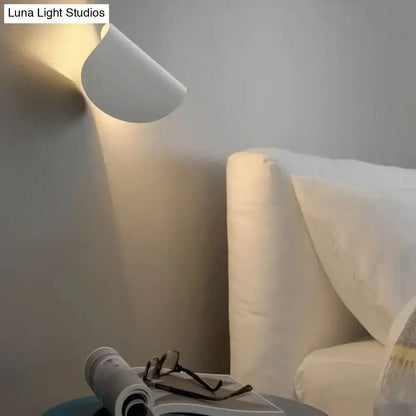 Modern curved white wall sconce light, wall-mounted for bedroom ambient lighting Decorbites on Tampa Home & Garden Store