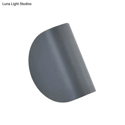 Modern curved wall sconce light gray metal shade by Decorbites for bedroom ambient lighting on Tampa Home & Garden Store
