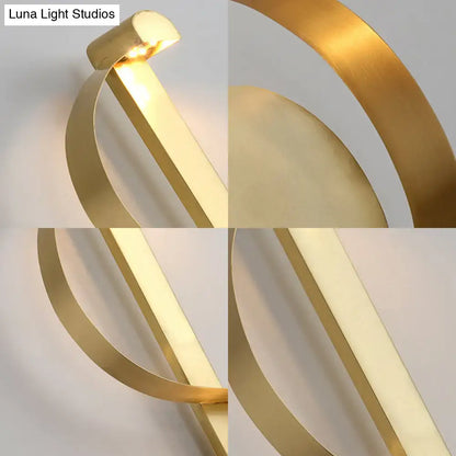 Gold curved wall sconce by Decorbites, aluminum build, modern lighting on Tampa Home & Garden Store
