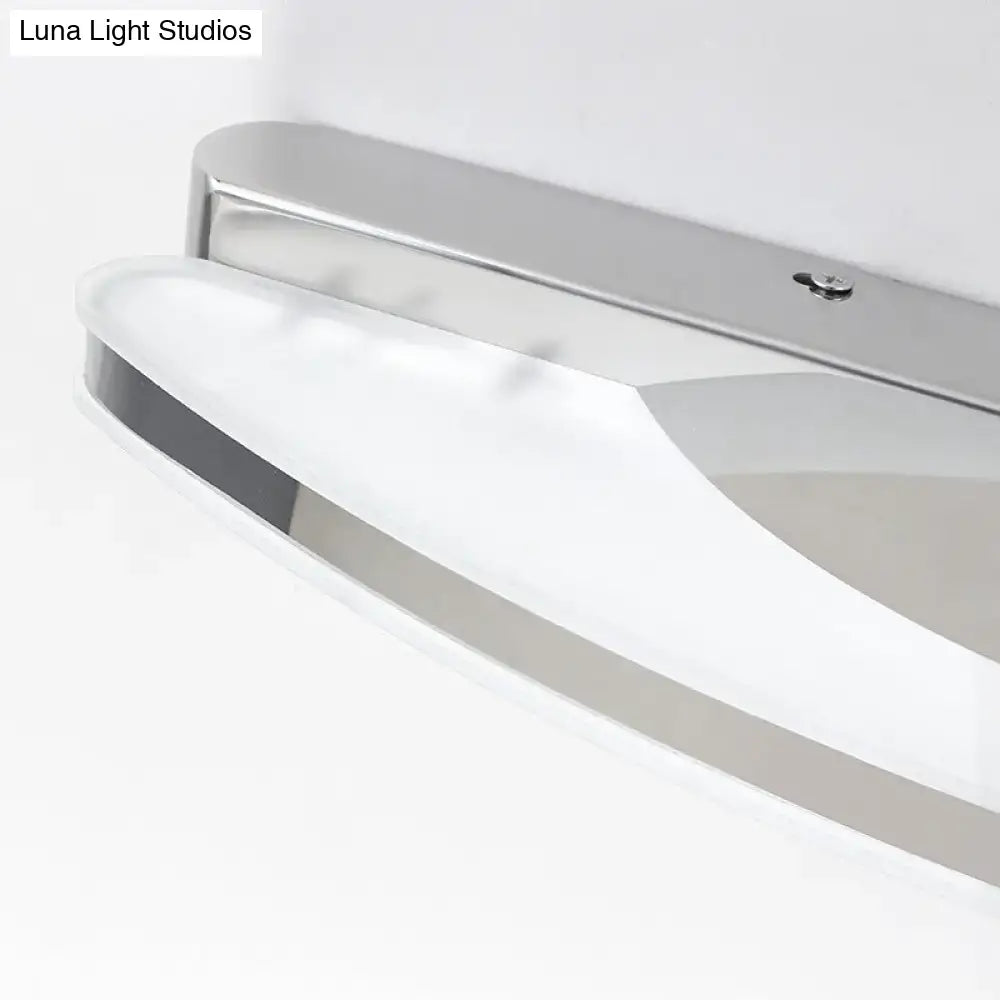 Chrome LED single-light vanity sconce with curved glass shade wall-mounted on Tampa Home & Garden Store