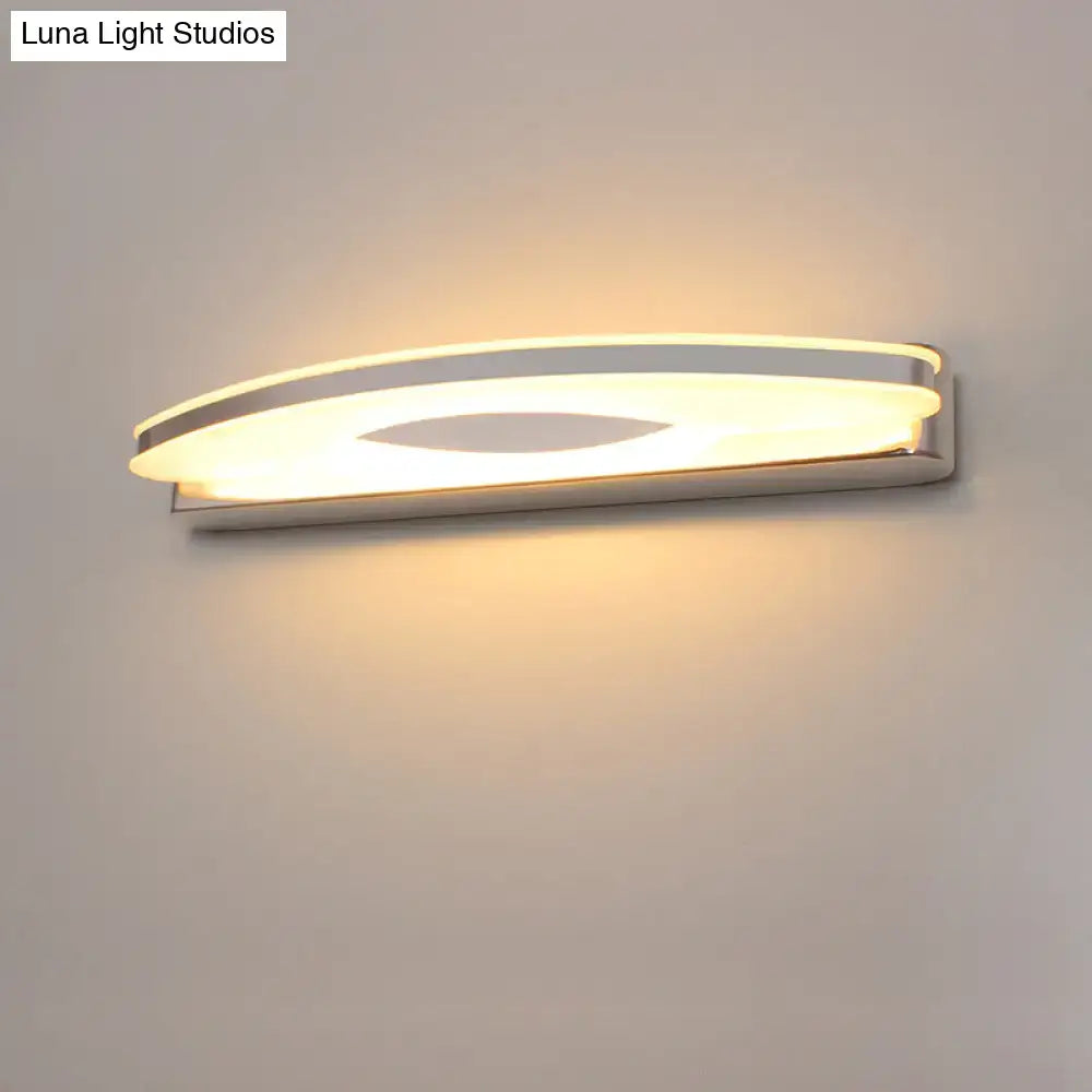 Chrome LED single-light vanity sconce by Decorbites with curved oval white diffuser wall mounted on Tampa Home & Garden Store