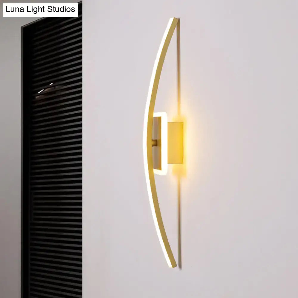 Gold Coffee linear wall sconce by Decorbites with brass arc and white LED edge, wall mounted on Tampa Home & Garden Store