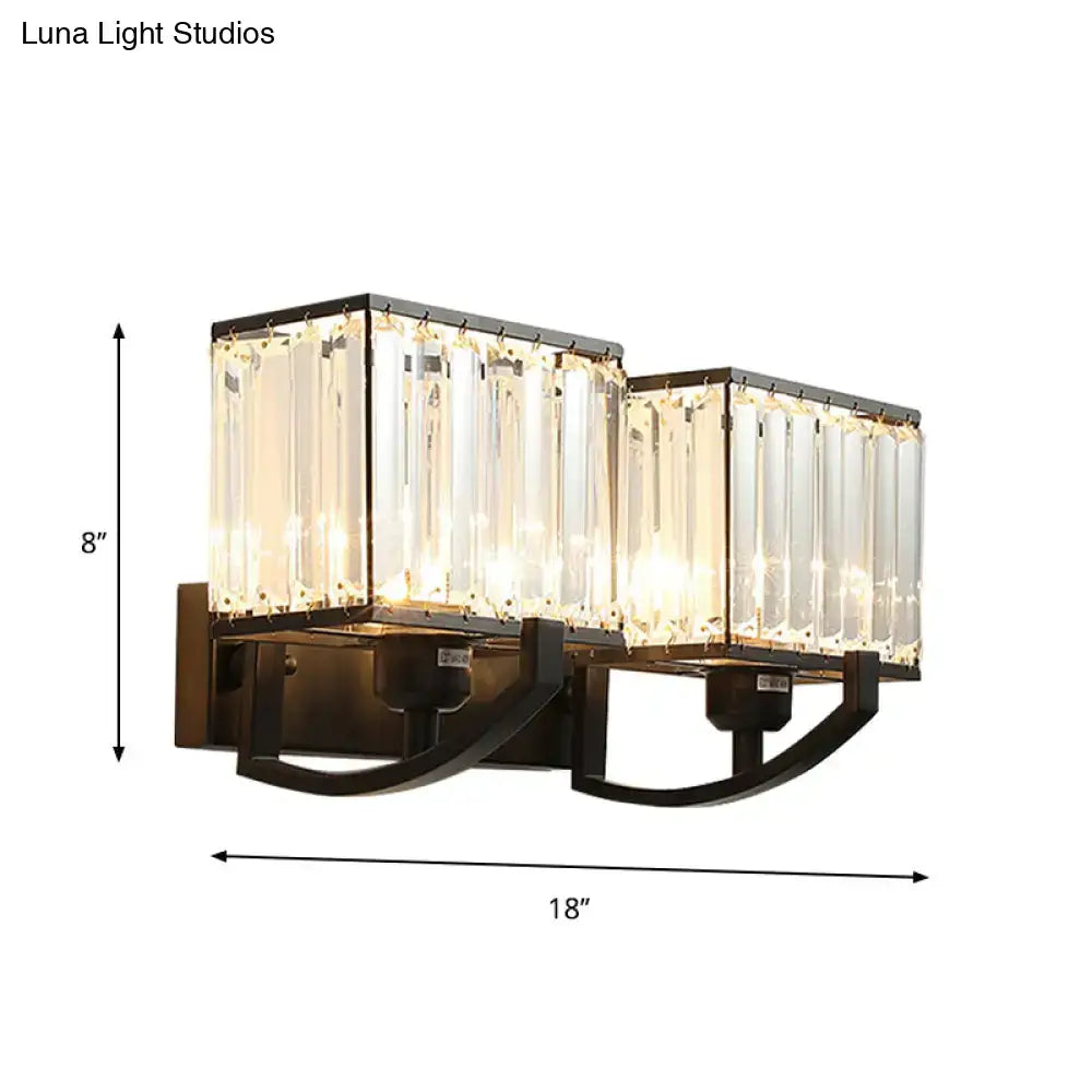 Decorbites crystal wall sconce light with rectangular glass prisms and dark bronze mount on Tampa Home & Garden Store